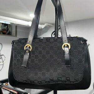 ST. JOHN Black Logo Embossed
Canvas purse